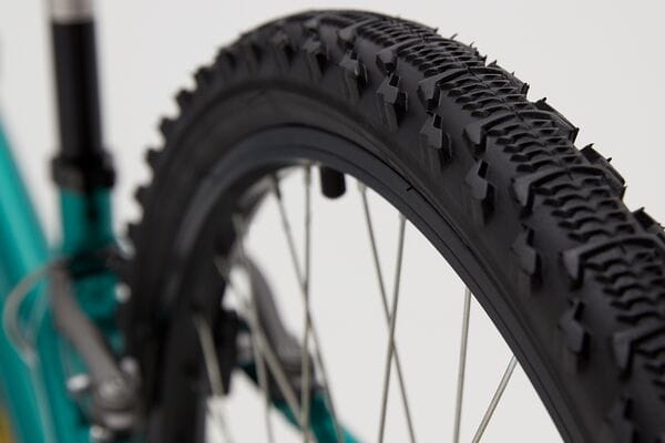 BIKE RB 21 DESTINY 24 INCH WHEEL PURPLE+F402 18 24-inch wheel close-up with tire treads on Destiny bike