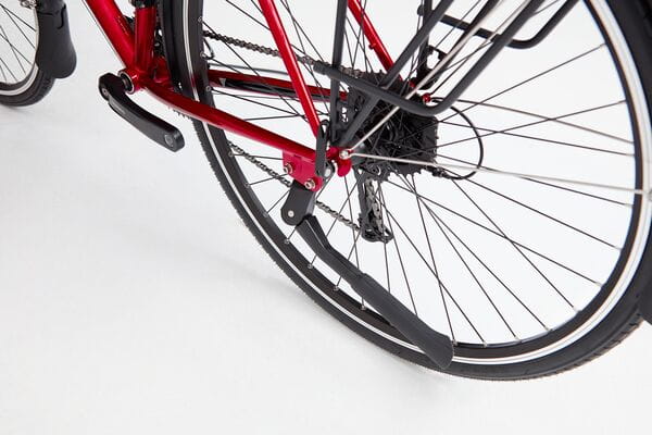 Voyage Red Touring Bike – Reynolds 520 Frame, 27-Speed Shimano, Full Mudguards & Rear Rack 9 Voyage Red Touring Bike beside a tent and camping gear